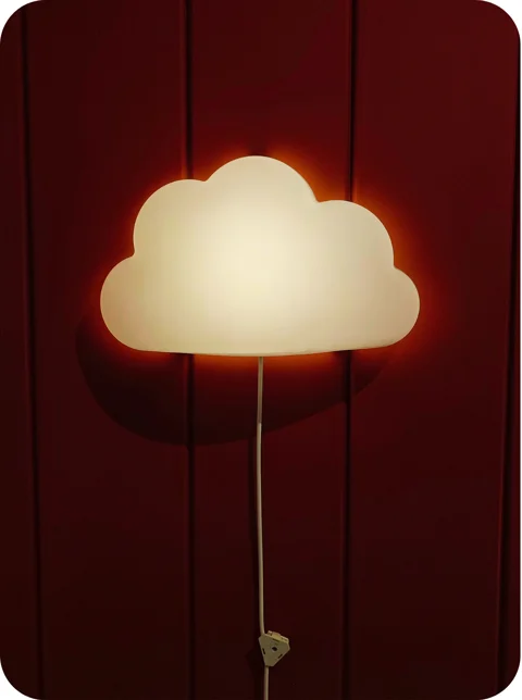 cloud-shaped nightlight on a wall cloud-shaped nightlight on a wall