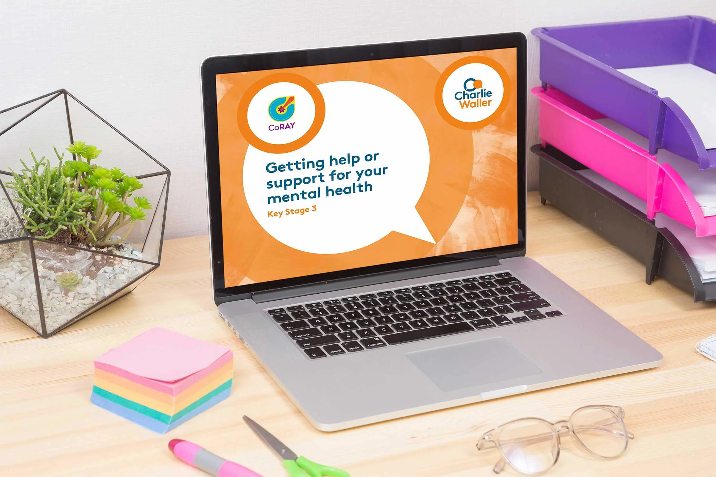 Laptop with CoRAY powerpoint on it