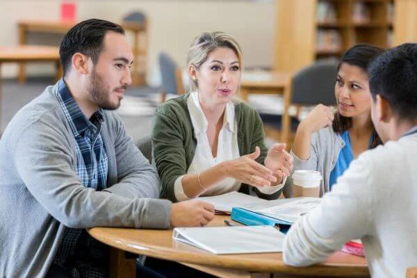 Group of teachers talking Group of teachers talking