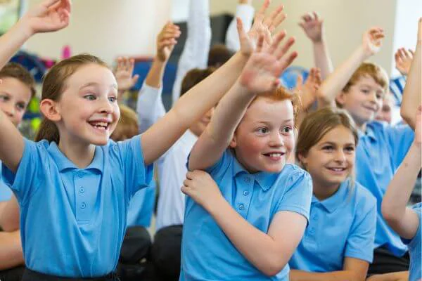 Primary School Children Holding Hands Up Primary School Children Holding Hands Up