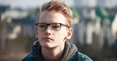 Young boy looking into the distance Young boy looking into the distance
