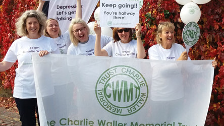 Some of the Charlie Waller Trust staff cheering at an event