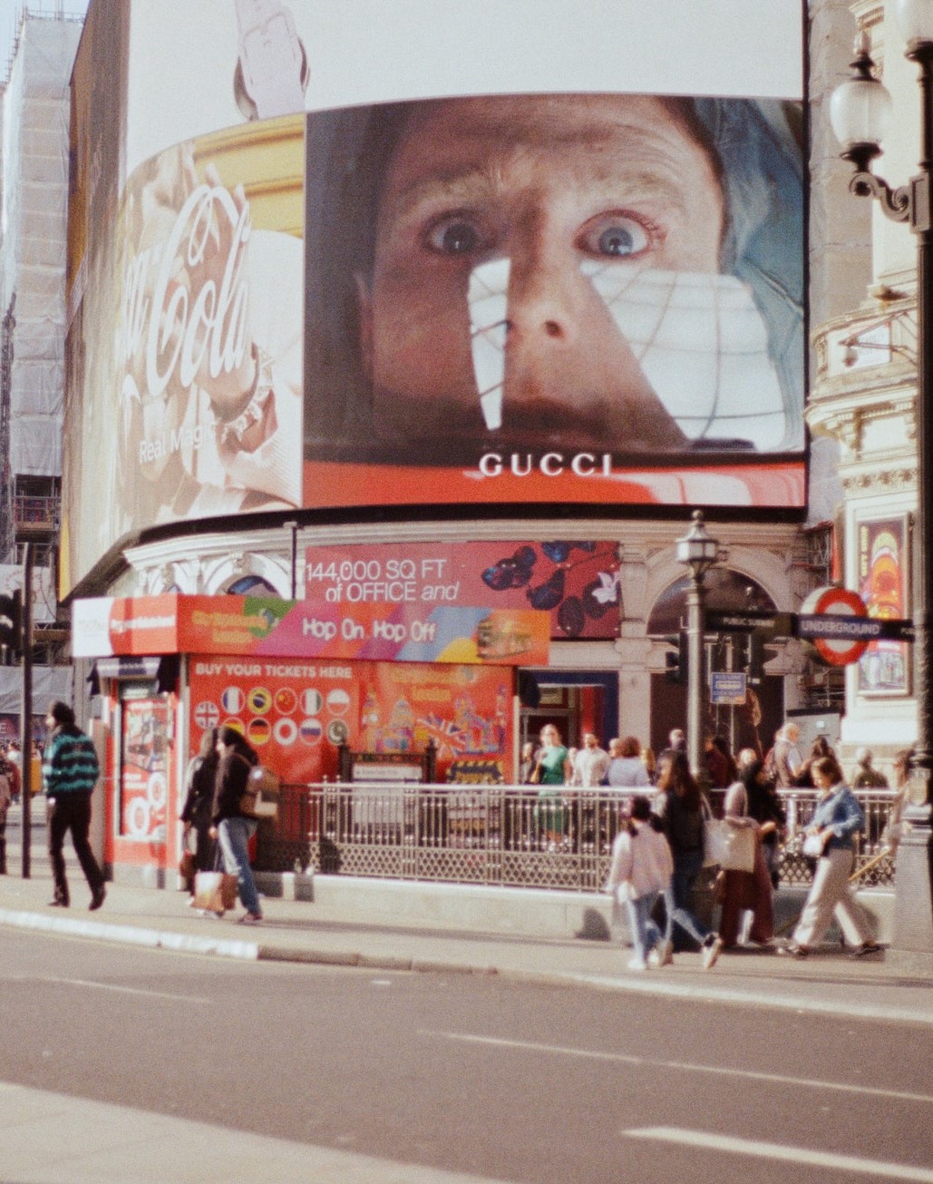 Big ad screens at Piccadilly Circus, London, advertising beauty brands